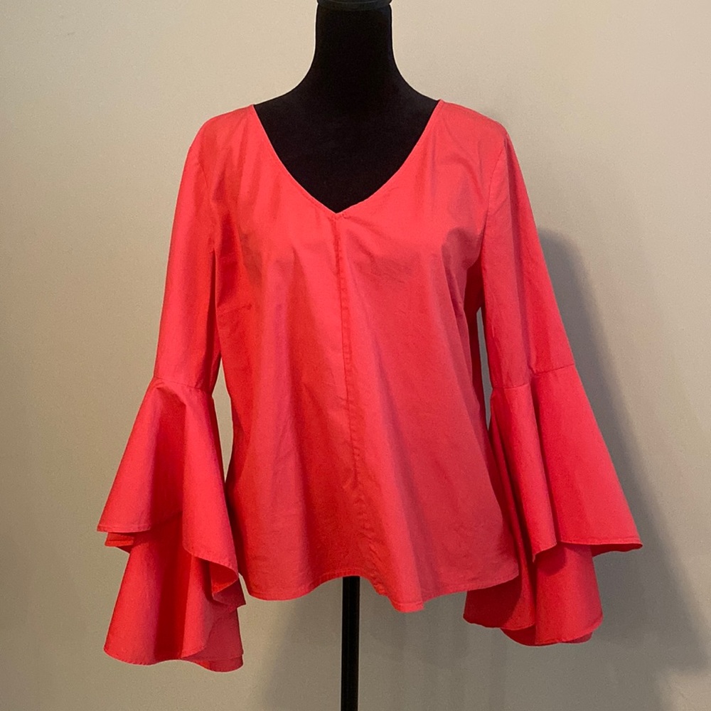 Olivia Culpo trumpet sleeve blouse
